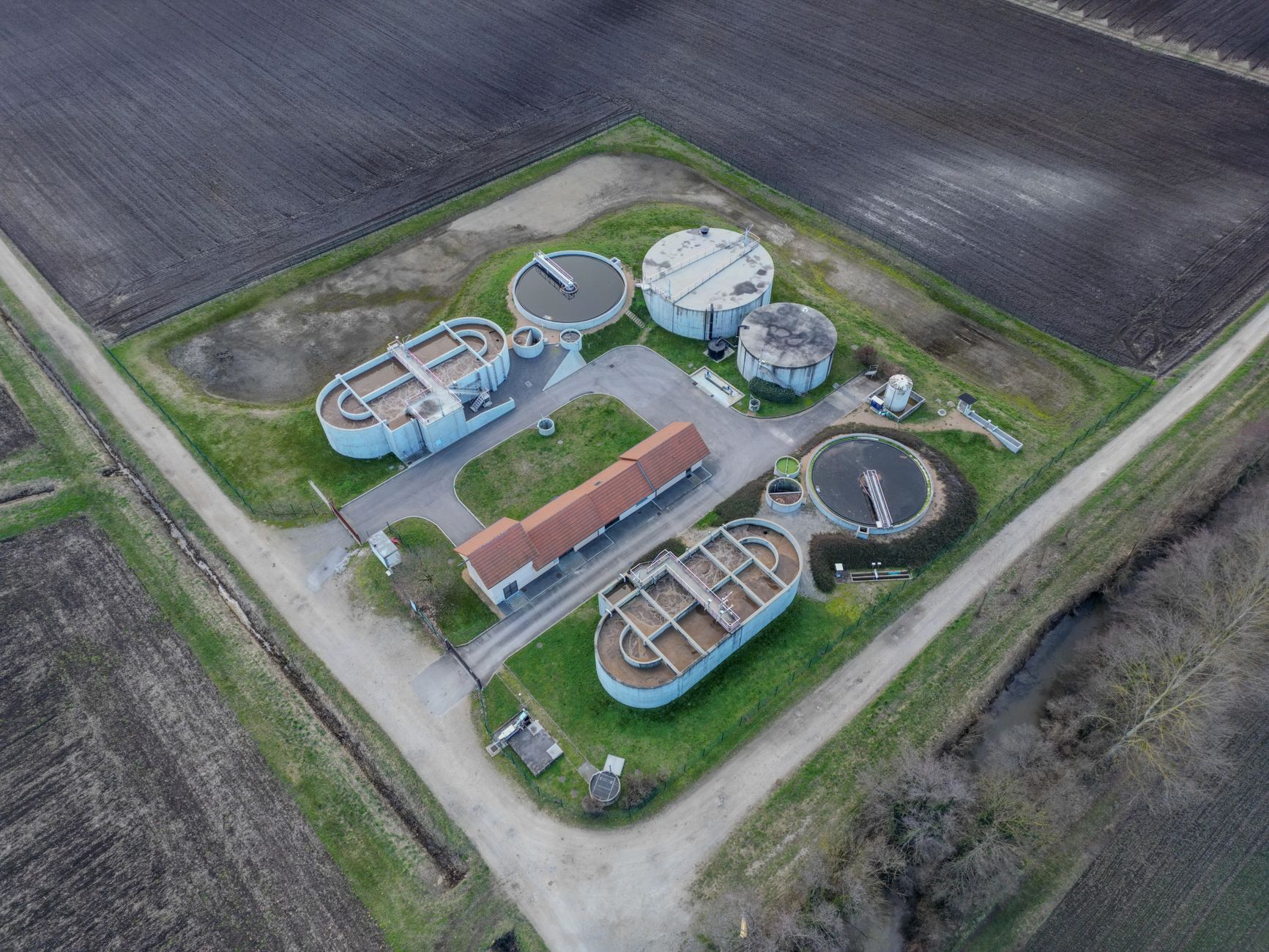 Aerial photo of sewage treatment plant in Saint-Marcel-Bel-Accueil, France.