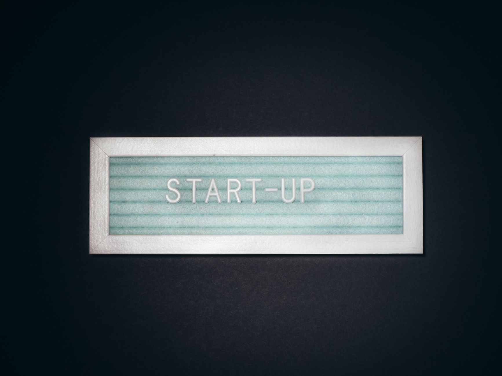 Close-up of a start-up sign with copy space, symbolizing business and innovation.